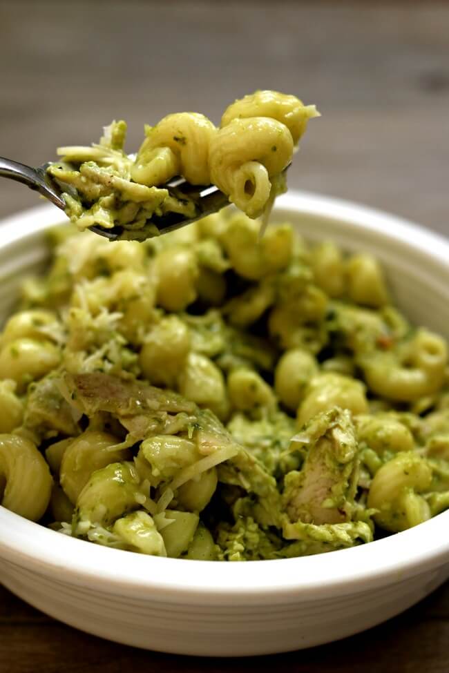 Easy Instant Pot Chicken Pesto Pasta--4 ingredient chicken and pasta with basil pesto sauce. Start with frozen chicken breasts and a few minutes later you'll have an amazing dinner in front of you.  