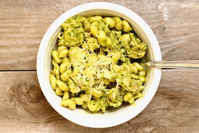 Easy Instant Pot Chicken Pesto Pasta--4 ingredient chicken and pasta with basil pesto sauce. Start with frozen chicken breasts and a few minutes later you'll have an amazing dinner in front of you.  