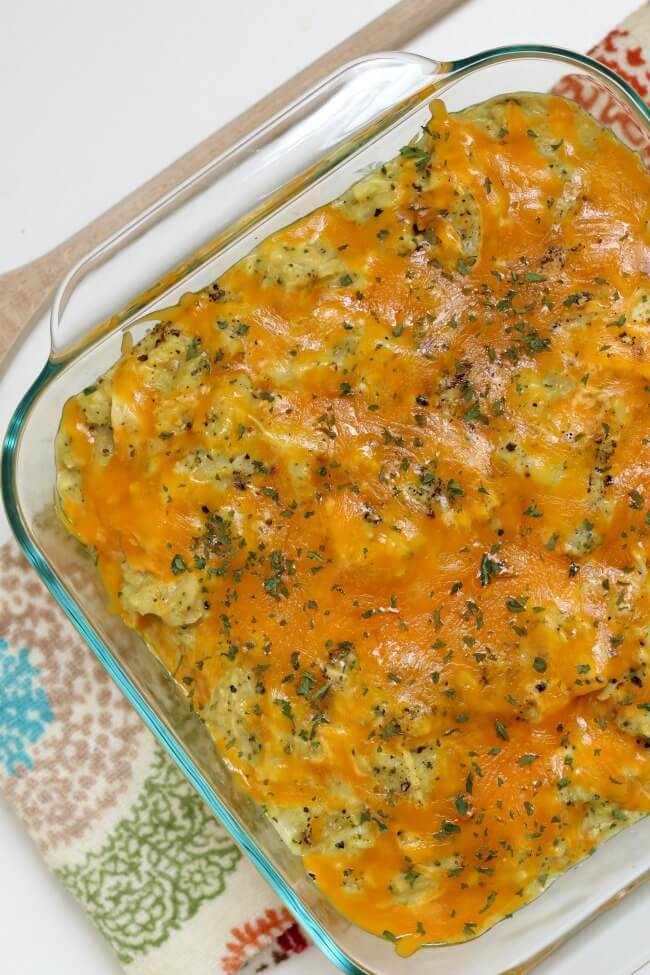 Slow Cooker Chicken Curry Broccoli Casserole--creamy mild curry-flavored rice with chunks of tender chicken,  florets of broccoli and lots of cheddar. A family favorite casserole recipe perfect for any weeknight. 