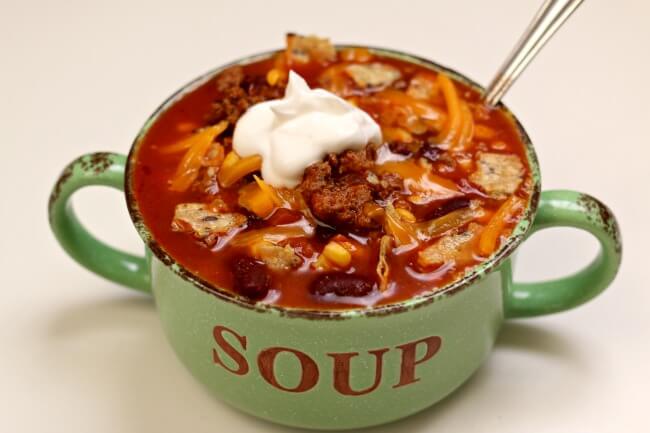 Instant Pot Taco Soup--basic but delicious taco soup that can be made quickly in your electric pressure cooker. Everyone needs this recipe up their sleeve for those busy weeknights.