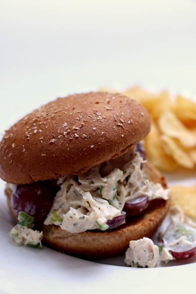 Instant Pot Chicken Salad Sandwich--chicken is pressure cooked quickly and then tossed with the best chicken salad dressing to make a fantastic topping for a bed of lettuce, a bun or croissant. 