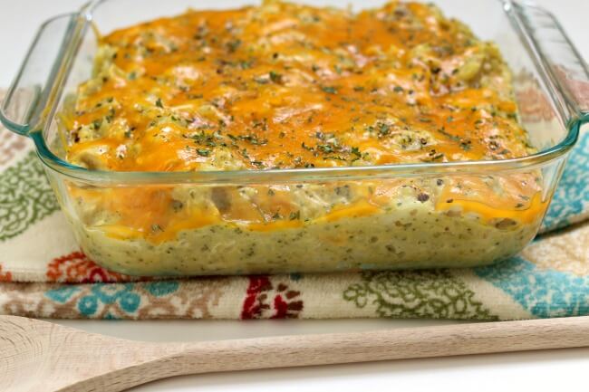 Slow Cooker Chicken Curry Broccoli Casserole--creamy mild curry-flavored rice with chunks of tender chicken,  florets of broccoli and lots of cheddar. A family favorite casserole recipe perfect for any weeknight. 