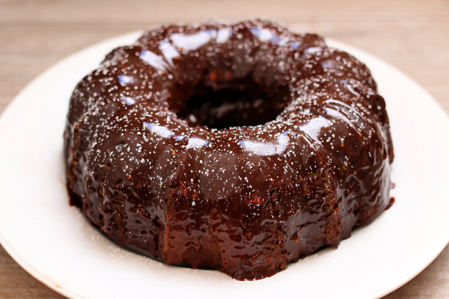 Instant Pot Chocolate Bundt Cake--the moistest chocolate bundt cake ever! This cake is cooked using steam in your Instant Pot and then covered in a rich chocolate glaze. Just try to eat one piece! 