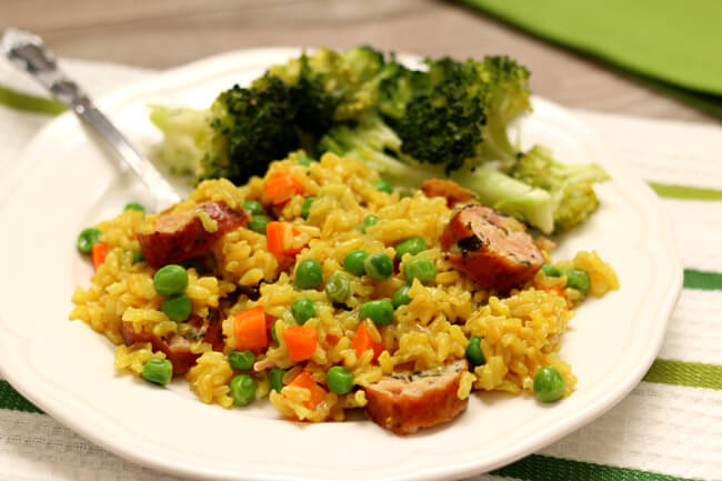 Instant Pot Brown Rice Pilaf with Chicken Sausage--a quick, easy and healthy meal of seasoned brown rice with carrots, peas and chicken sausage. 