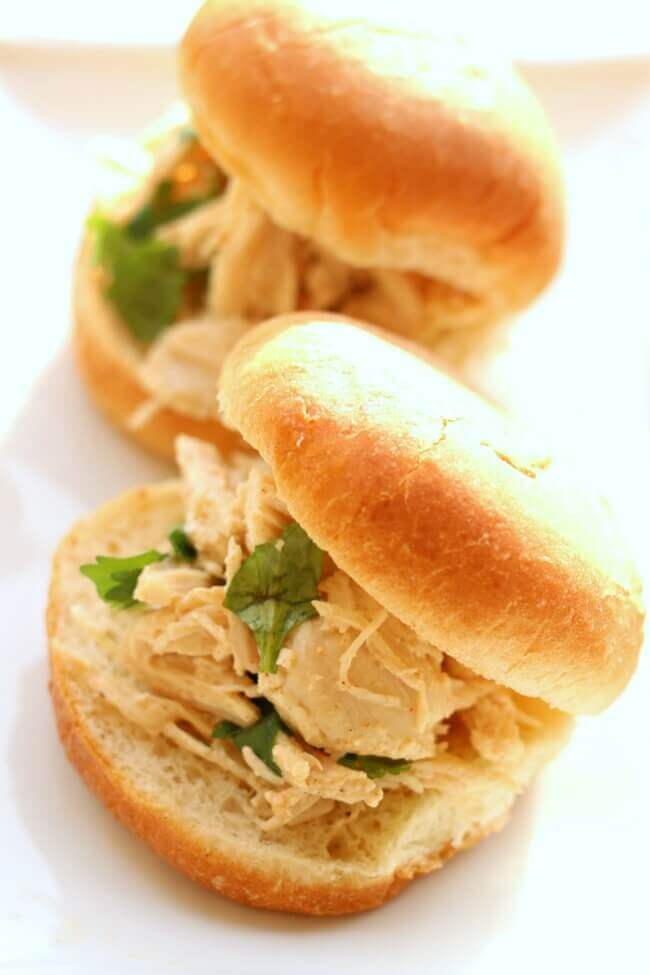 Instant Pot Cilantro Lime Chicken Sliders--tender shredded chicken with lime and cilantro flavors served on a mini bun or roll. An easy recipe made with frozen chicken in minutes. 