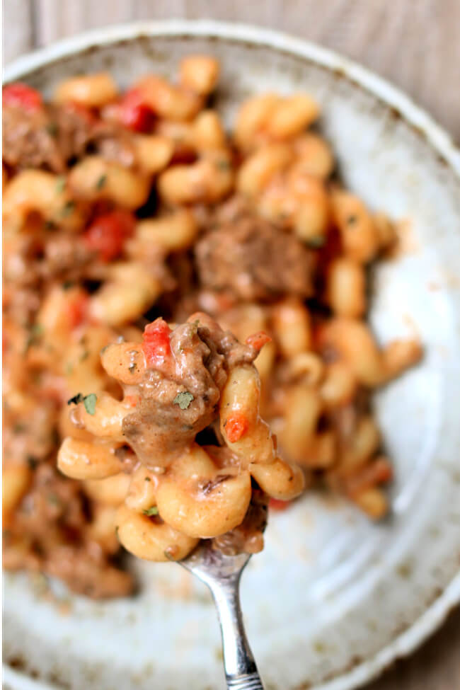Instant Pot Homemade Hamburger Helper--with just a little more effort than making a boxed meal you can have a homemade creamy tomato basil beef pasta meal. And with the help of your Instant Pot it takes just a few minutes.