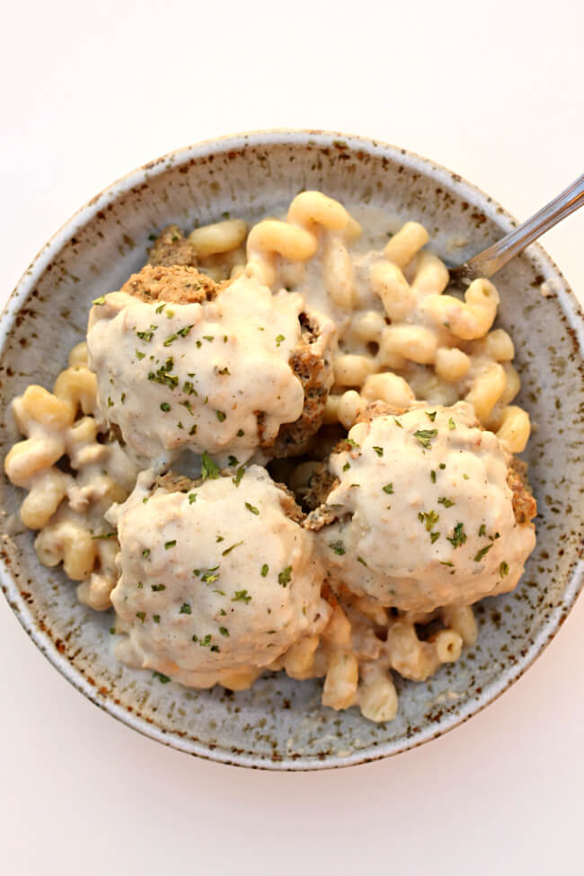 Instant Pot Chicken Alfredo Meatballs--chicken meatballs are served alongside pasta with an easy, homemade alfredo sauce. Pasta, meatballs and sauce are all cooked in one pot--your Instant Pot.