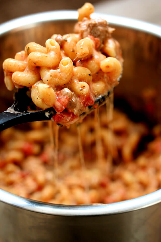 Instant Pot Homemade Hamburger Helper--with just a little more effort than making a boxed meal you can have a homemade creamy tomato basil beef pasta meal. And with the help of your Instant Pot it takes just a few minutes.
