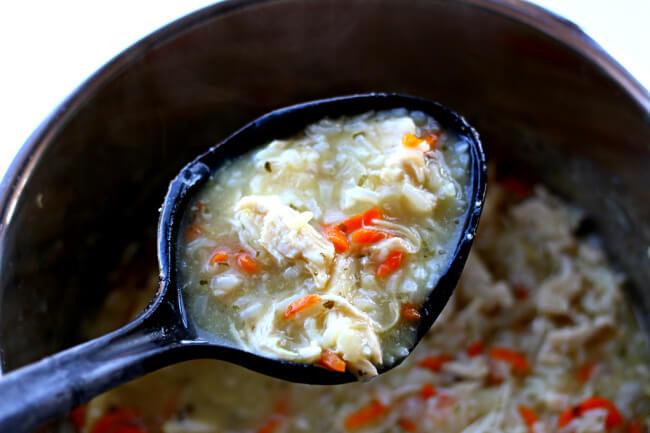 Instant Pot Chicken Lemon Orzo Soup--a bright lemon-flavored broth based soup with chunks of chicken and bites of orzo (or rice). Easy to make and delicious to eat! 