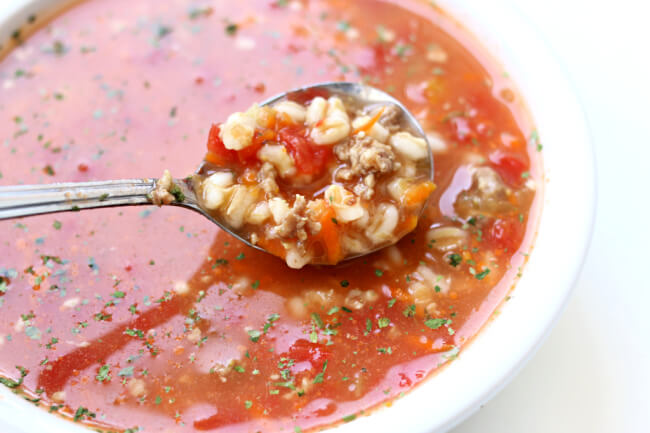 Slow Cooker Sausage Barley Soup--with Italian sausage and barley this soup has flavor and texture in every spoonful. It's perfect for a cold night supper and the leftovers are the best for lunch the next day. ﻿