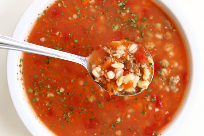 Instant Pot Sausage Barley Soup--with Italian sausage and barley this soup has flavor and texture in every spoonful. It's perfect for a cold night supper and the leftovers are the best for lunch the next day.