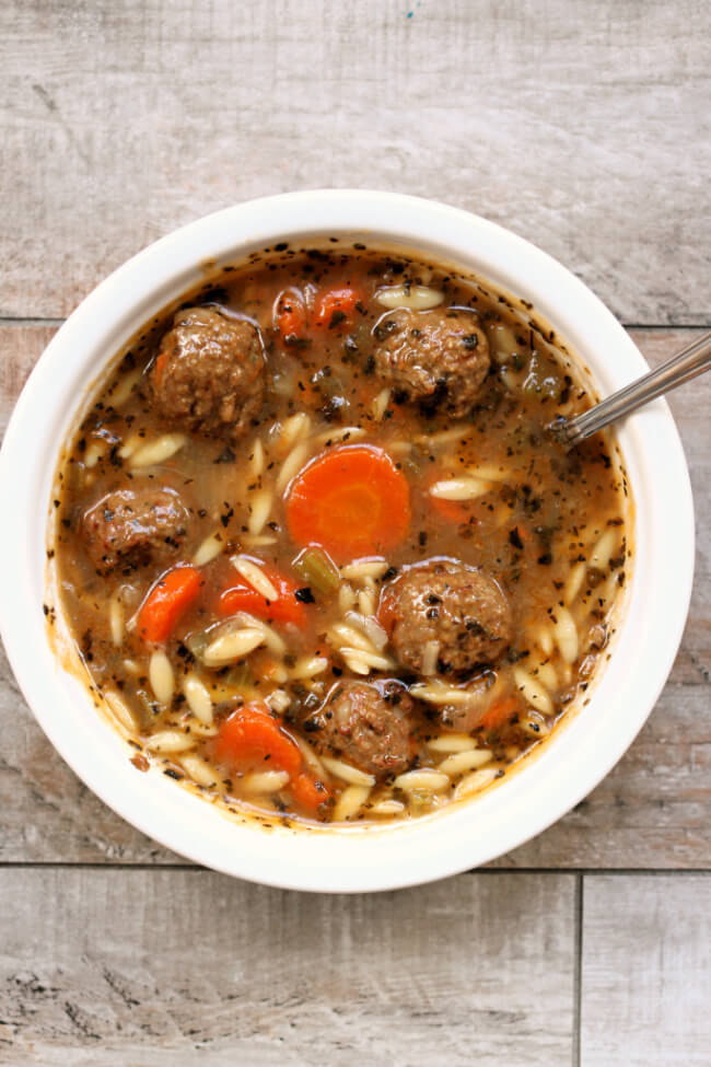 Instant Pot Italian Wedding Soup--a quick and easy version of a popular soup. A flavorful brothy soup with orzo and meatballs. 