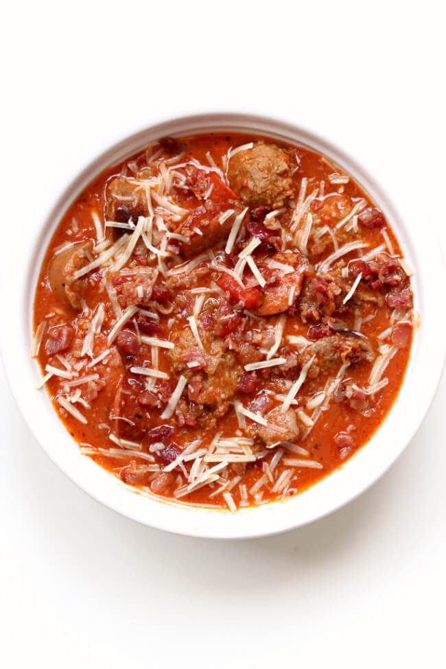 Slow Cooker Meat Lovers Soup--if you're a fan of all the meats you're going to love this hearty soup. With meatballs, smoked sausage, brats, bacon, pepperoni and ground beef there is literally meat in every single bite. If you have a carnivore in your life they will love this dinner!