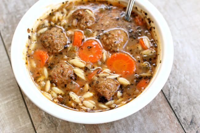 Instant Pot Italian Wedding Soup--a quick and easy version of a popular soup. A flavorful brothy soup with orzo and meatballs. 