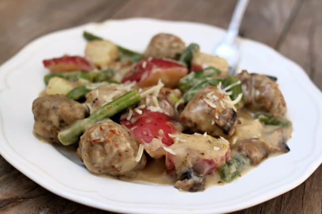 Instant dumplings and red potatoes with creamy Parmesan sauce—Red potatoes, green beans, dumplings and mushrooms are topped with a creamy Parmesan sauce. An easy meal from a pot. Frozen meatballs are used to facilitate preparation.