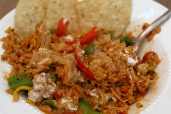 Instant Pot Chicken Fajita Rice-a throw everything into the Instant Pot and get away with the food! Tasty rice and chicken that has all the great flavors of chicken fajitas! Make it with brown or white rice.