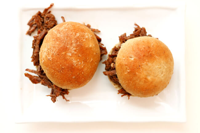 Instant Pot BBQ Beef Sandwiches--tender shredded beef with an easy homemade barbecue sauce served on a toasted bun. An easy and delicious dinner!﻿