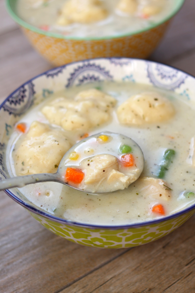 Instant Pot Chicken and Dumplings--a creamy chicken soup with dumplings and mixed vegetables. Make this classic dish quickly in your Instant Pot! 