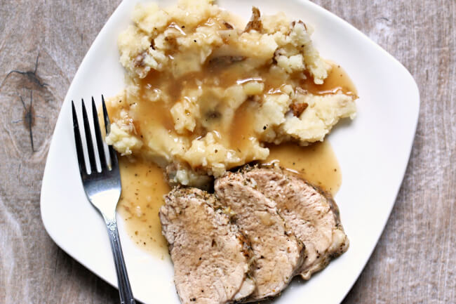 Instant Pot Garlic Pork Tenderloin and Mashed Potatoes--tender slices of seasoned pork with creamy mashed potatoes and gravy. All made in one pot, your Instant Pot. 