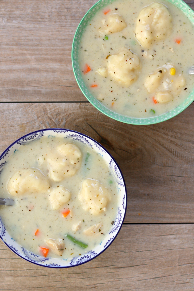 Slow Cooker Chicken and Dumplings--a creamy chicken soup with dumplings and mixed vegetables. Make this classic dish easily in your slow cooker! 
