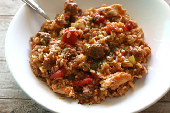 Slow Cooker Chicken and Sausage Jambalaya--an easy, healthier, non-spicy version of jambalaya. It has so much flavor, you're going to love it!