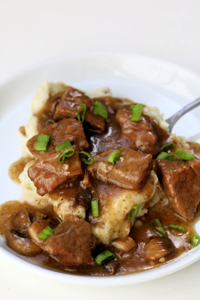 Instant Pot Beef and Gravy--tender bites of beef with mushrooms served with a savory gravy. Serve over mashed potatoes, egg noodles or rice. 