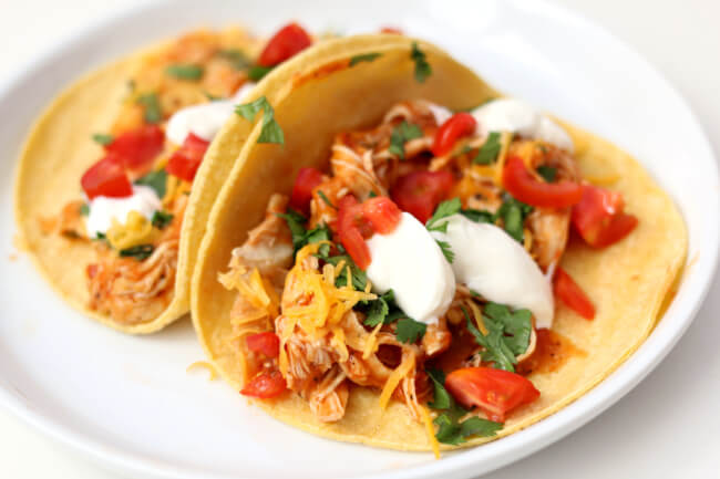 Slow Cooker Chicken Tinga Tacos--easy to make smoky chicken tacos with all the fixings. A fresh weeknight meal that comes together quickly. 
