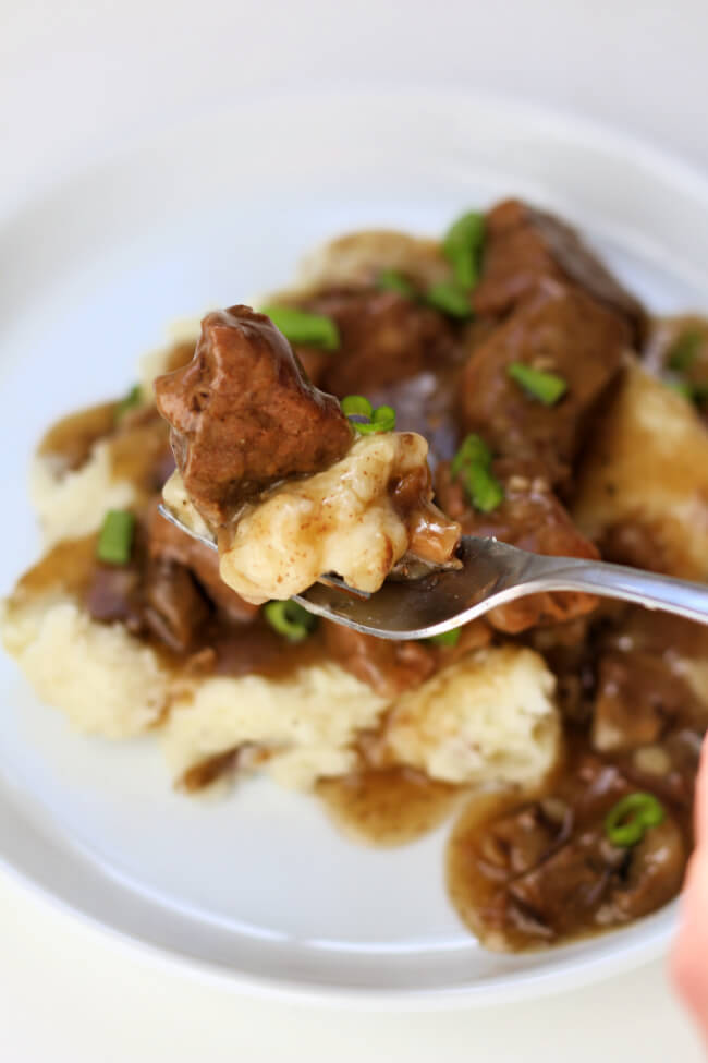 Instant Pot Beef and Gravy--tender bites of beef with mushrooms served with a savory gravy. Serve over mashed potatoes, egg noodles or rice. 