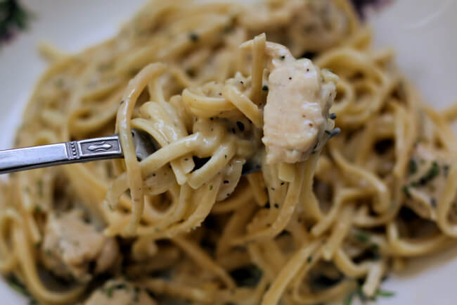 Instant Pot Skinny Chicken Alfredo--a lighter version of creamy dreamy chicken alfredo that you can make all in one pot, your Instant Pot. 