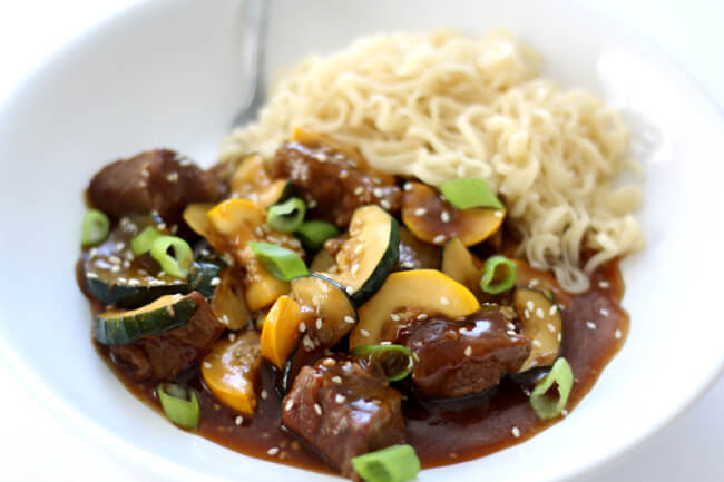 Slow Cooker Sesame Beef with Zucchini--tender chunks of beef with bites of zucchini in an easy stir fry sauce. 