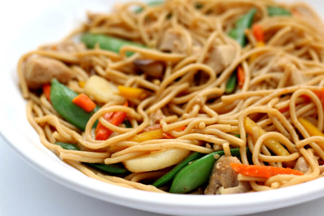 Instant Pot Chicken Lo Mein--an easy make-at-home version of your favorite Chinese takeout meal. Spaghetti, bites of chicken and lots of veggies are pulled together with a savory asian sauce. 