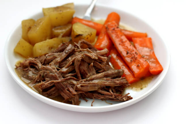Mom's Slow Cooker Pot Roast--pot roast, potatoes, carrots and gravy just like Mom used to make. An easy recipe that tastes like home. 