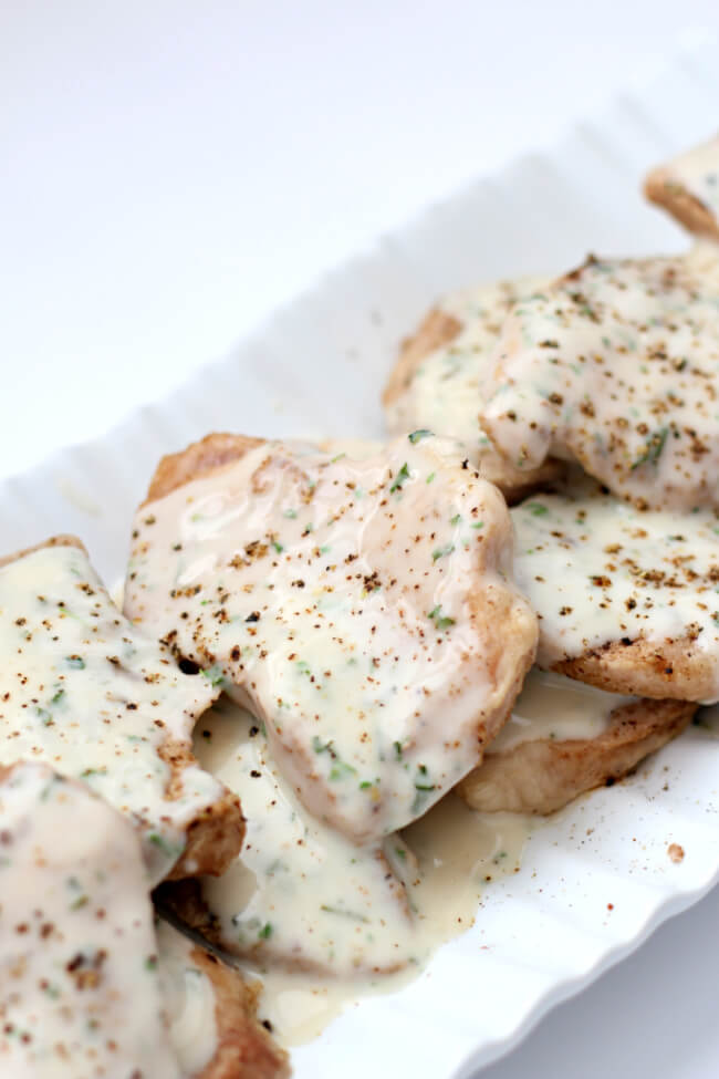 Instant Pot Sour Cream Pork Chops--tasty pork chops with hardly any ingredients. The creamy sauce tastes amazing and this recipe is low carb. 