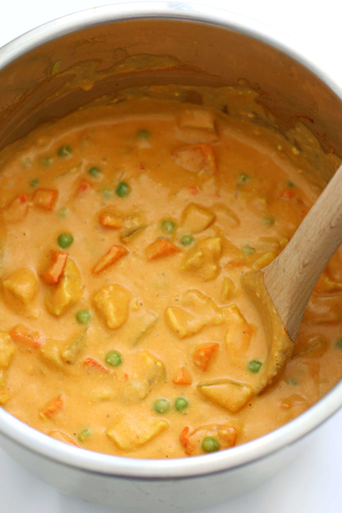 Instant Pot Chicken Veggie Korma--a rich and creamy mild curry-like dish  with tender bites of chicken and vegetables. 