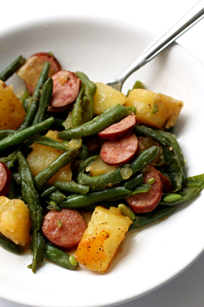 Instant Pot Smoked Sausage, Green Beans and Potatoes--the easiest meal with the most amazing results. Smoked sausage, fresh green beans, cubed potatoes and a couple of seasonings are cooked together quickly in your electric pressure cooker for an easy one pot, dump and press start meal. 