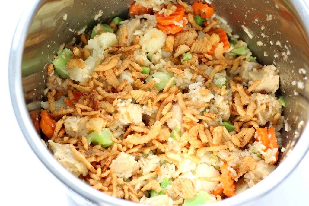 Instant Pot Zesty Chicken--an easy, flavorful casserole with rice, chicken, crispy fried onions and vegetables.