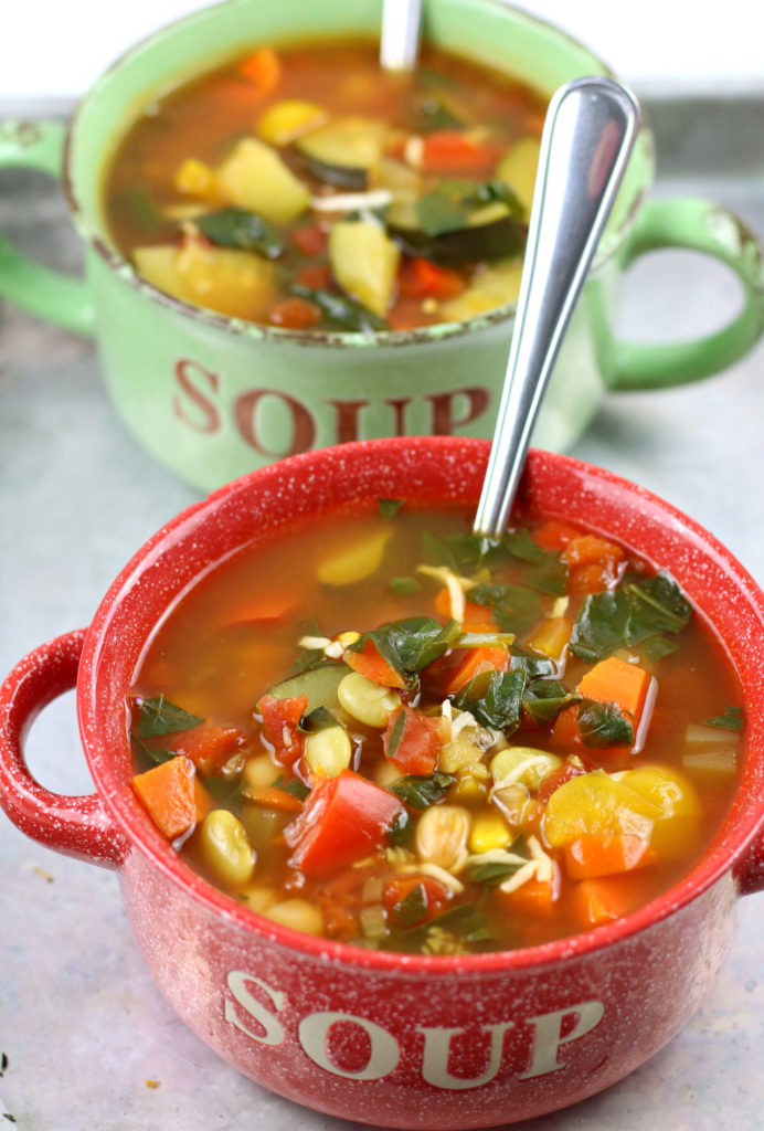 red and green soup bowls with vegetable soup