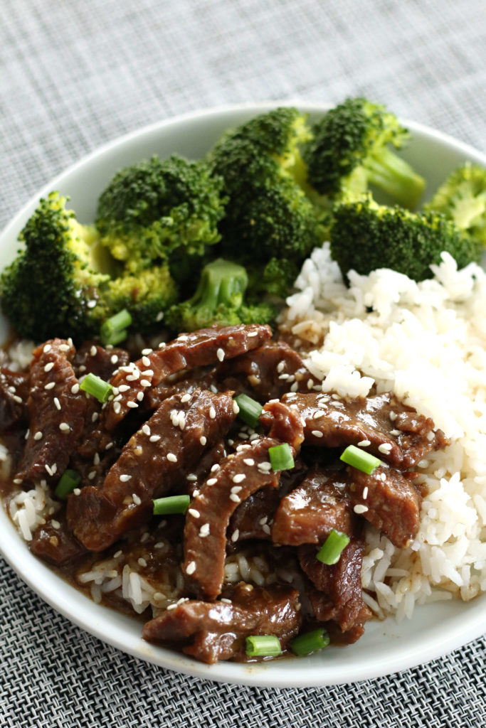 beef rice and broccoli on a plate