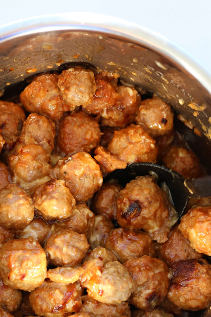 Instant Pot French Onion Meatballs--French onion meatballs take minimal effort but taste so good! You'll be surprised at how easy it is to caramelize onions in the Instant Pot and get that sweetness and richness to come out. Try these meatballs for an easy weeknight dinner or for an appetizer at a party! 