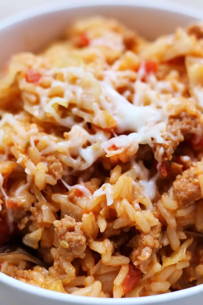 Easy One Pot Dirty Cabbage Casserole--an easy one-pot dinner made with Italian sausage, tender cabbage, fire-roasted tomatoes, rice and melty mozzarella cheese.