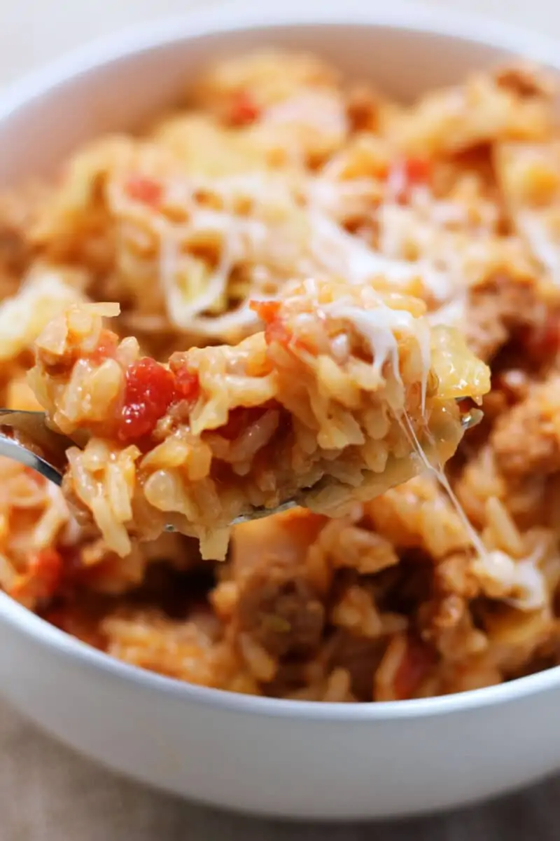 Easy One Pot Dirty Cabbage Casserole--an easy one-pot dinner made with Italian sausage, tender cabbage, fire-roasted tomatoes, rice and melty mozzarella cheese.