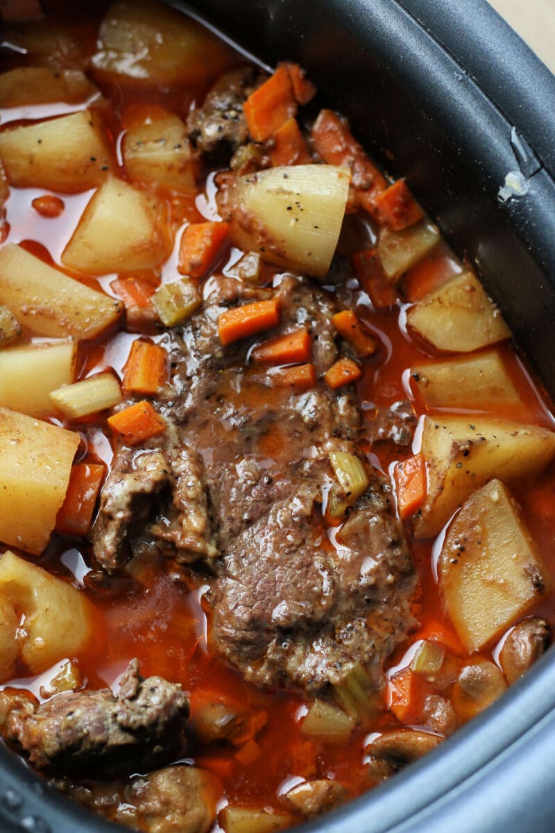 Montana Slow Cooker Roast--a crockpot meal meal loaded with juicy beef, carrots, potatoes, mushrooms, and a delicious homemade gravy.