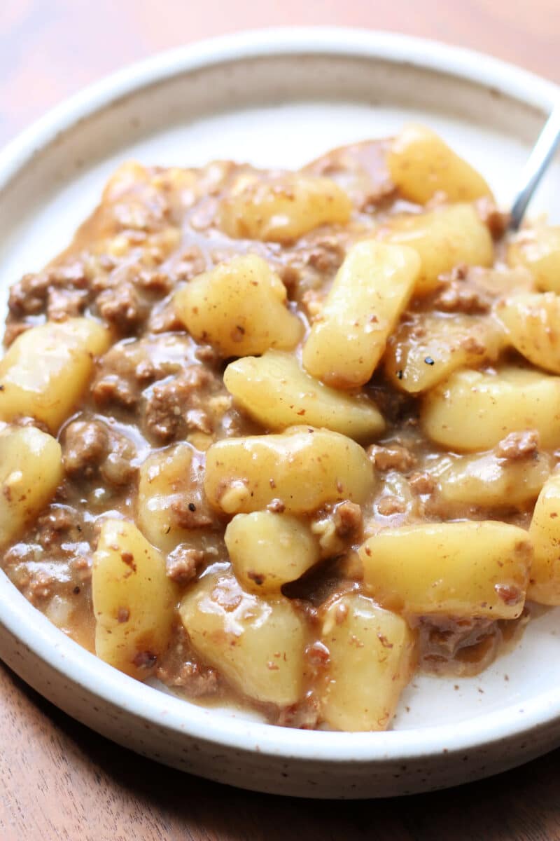 Cheesy French Onion Beef Potato Casserole--an easy Instant Pot or slow cooker stew-like dinner made with tender potatoes, savory ground beef, caramelized onions, smoky Gouda.