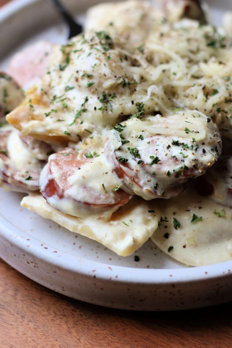Crockpot Pierogi Summer Sausage Casserole--a creamy sausage and pierogi skillet or crockpot recipe is an easy comfort food dinner the whole family will love.