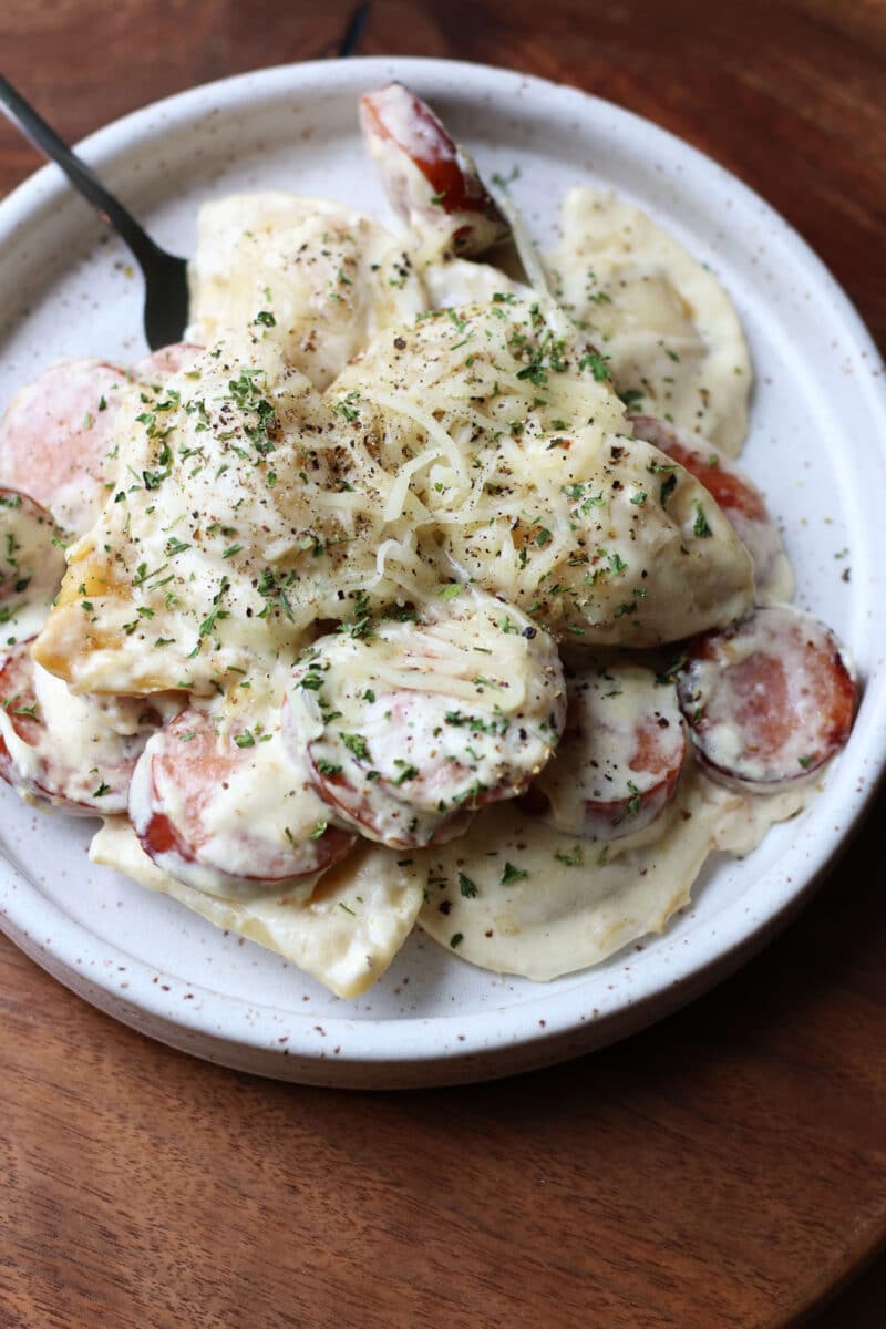 Crockpot Pierogi Summer Sausage Casserole--a creamy sausage and pierogi skillet or crockpot recipe is an easy comfort food dinner the whole family will love.