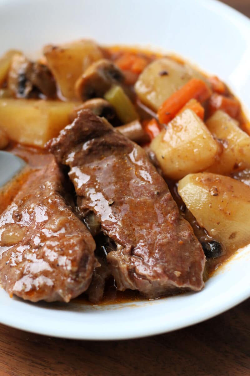 Montana Slow Cooker Roast--a crockpot meal meal loaded with juicy beef, carrots, potatoes, mushrooms, and a delicious homemade gravy.