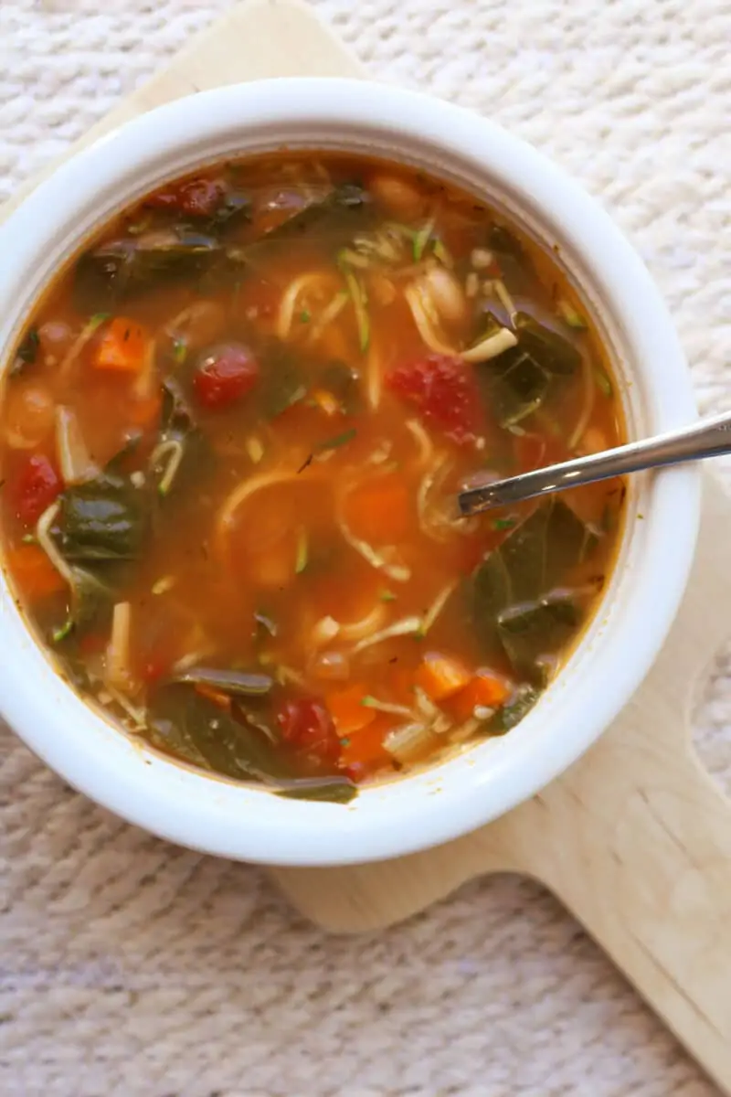The Great Smoky Mountain Soup--an easy Instant Pot or slow cooker soup recipe loaded with vegetables, white beans and a savory broth, then finished with melty smoked Gouda or Parmesan cheese.