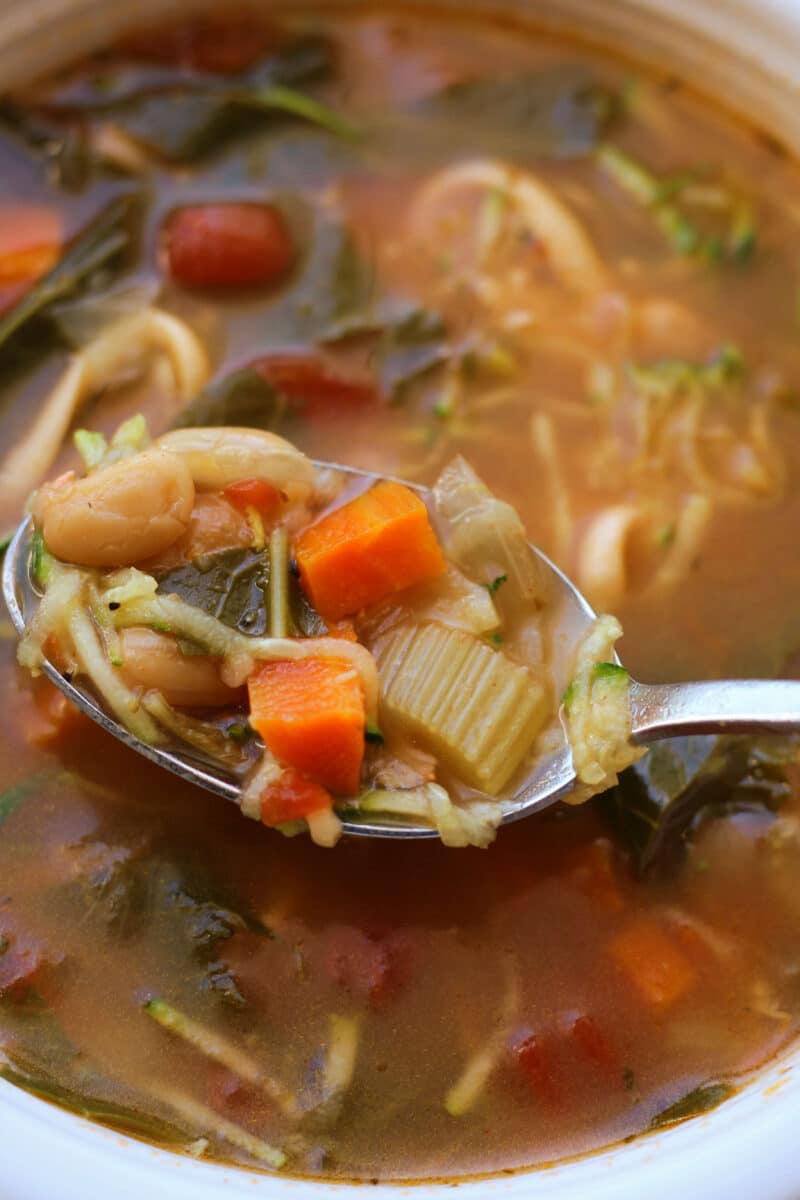 The Great Smoky Mountain Soup--an easy Instant Pot or slow cooker soup recipe loaded with vegetables, white beans and a savory broth, then finished with melty smoked Gouda or Parmesan cheese.