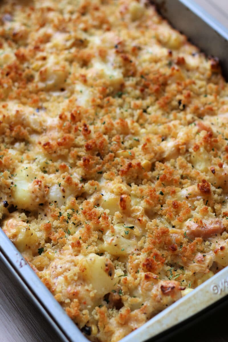 Pepper Jack Potato Casserole--a creamy, cheesy casserole made with tender potatoes, rotisserie chicken, sweet corn, pepper jack cheese and a crispy buttery panko topping.