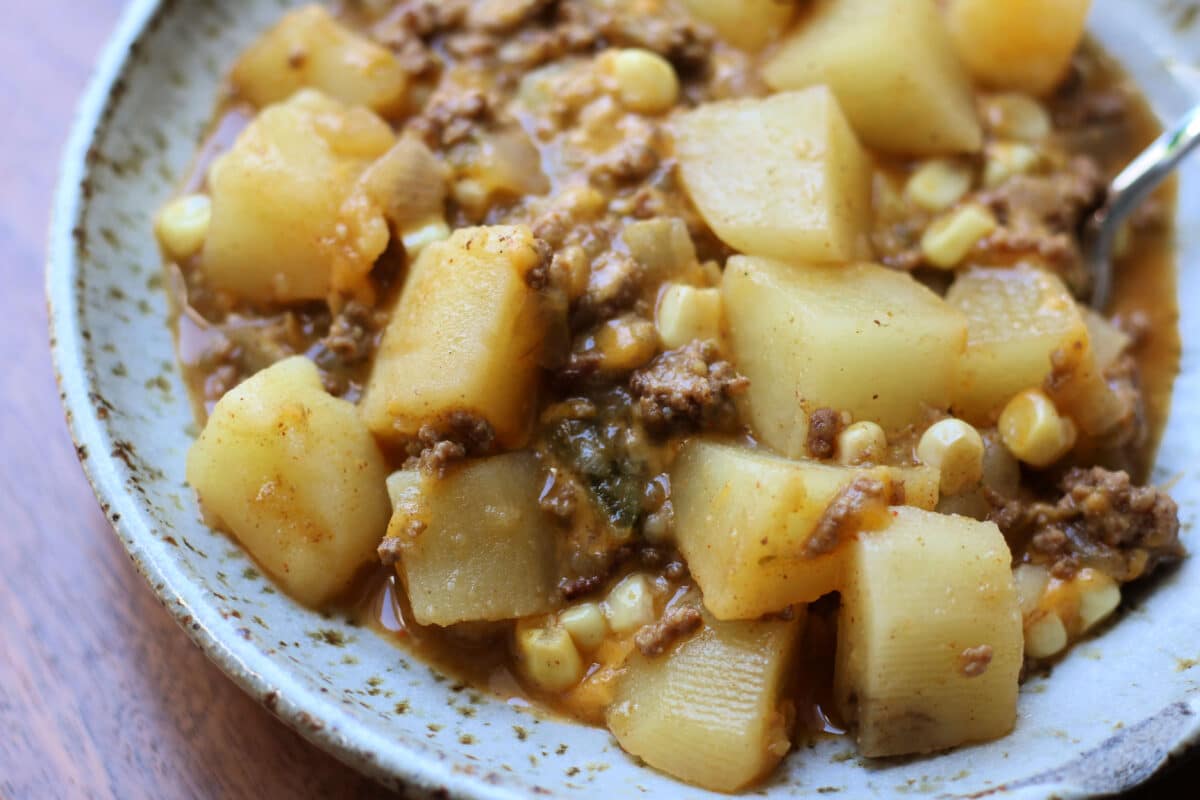 Southwest Ground Beef Potato Casserole--an easy Instant Pot dinner with seasoned ground beef, tender potatoes, salsa verde, and melted cheddar cheese.